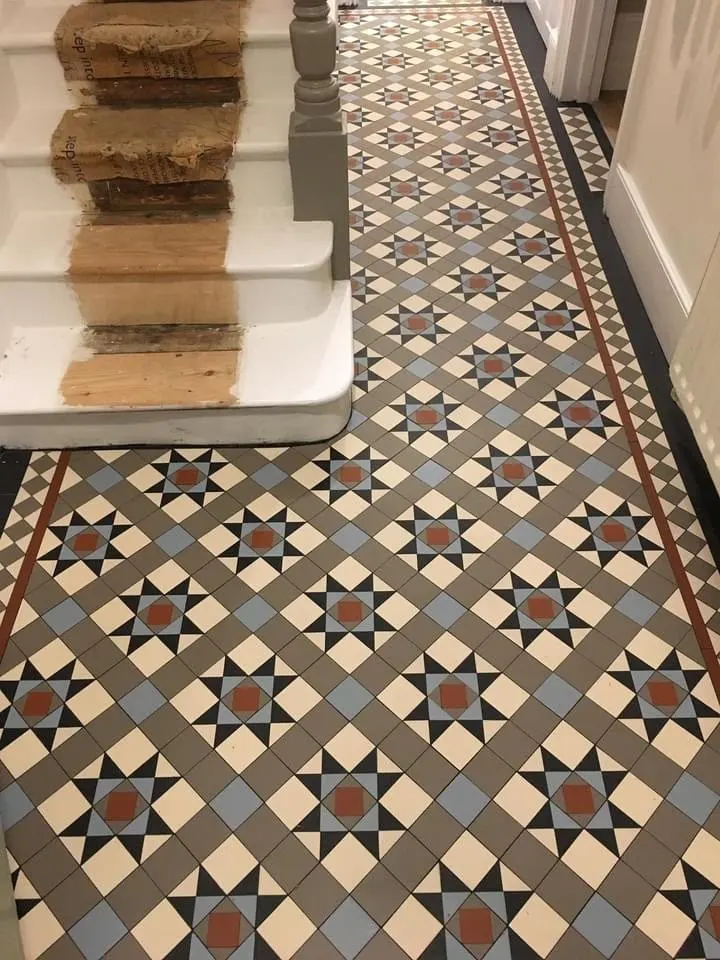 Floor and wall tiling in London: Victorian geometric mosaic hallway floor tiles